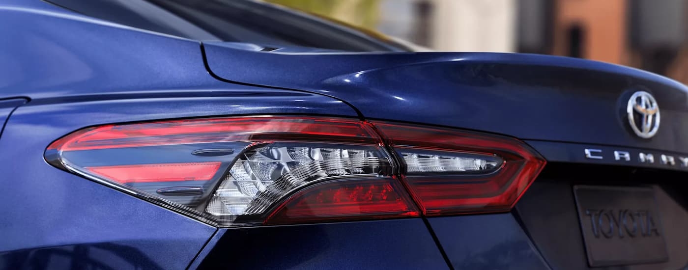 Rear trunk on a blue 2023 Toyota Camry.