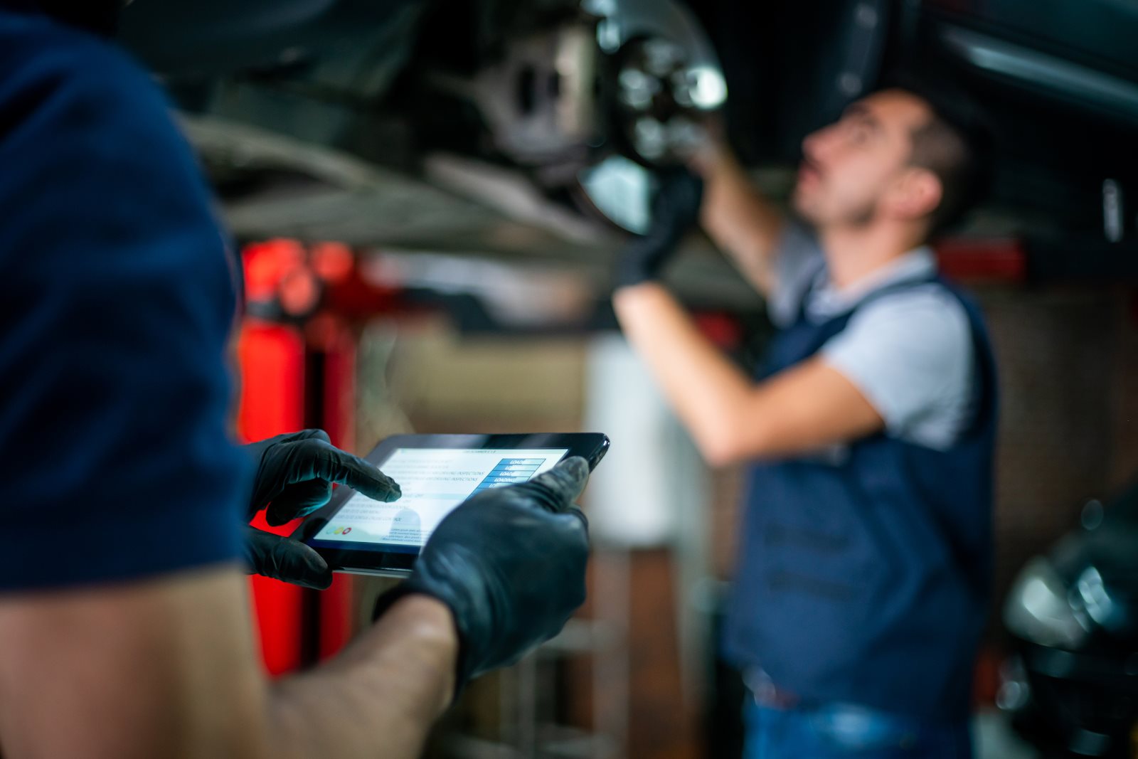 Technician using a diagnostic scanner