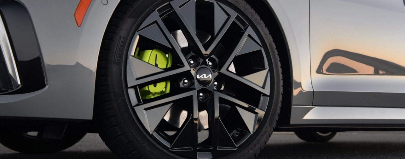 Black wheel on a grey 2025 Kia K5 GT.