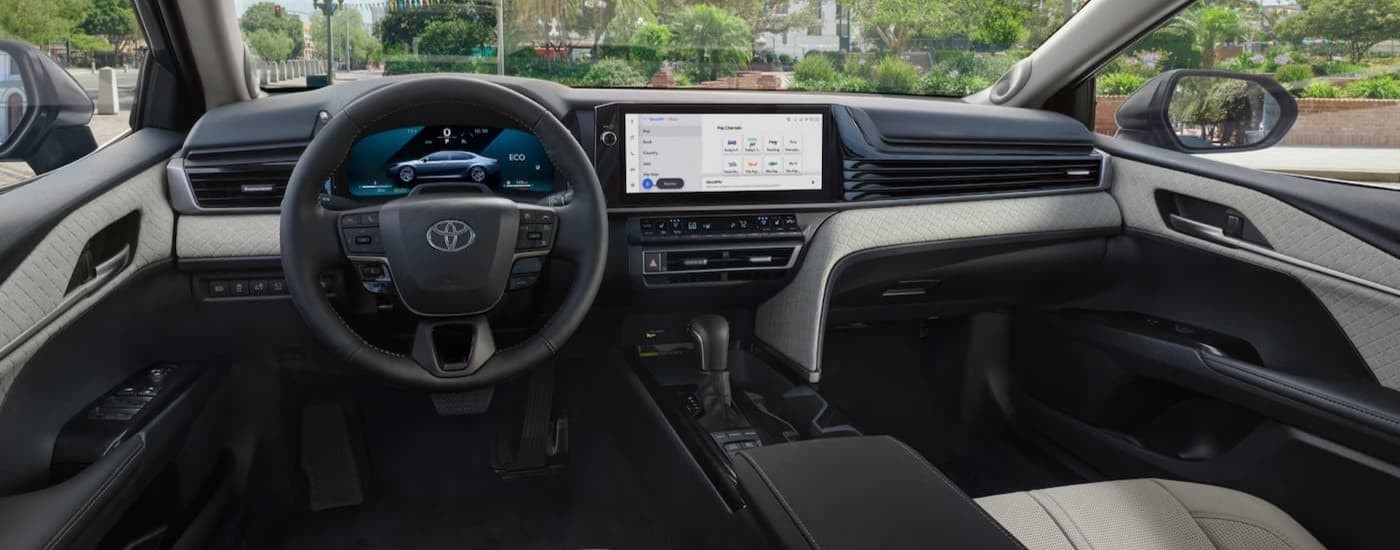 Black and gray interior and dash in a 2025 Toyota Camry.