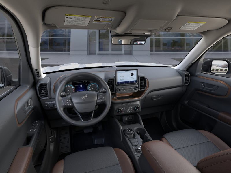 Inside the 2025 Ford Bronco, showcasing its roomy interior and tech-forward features