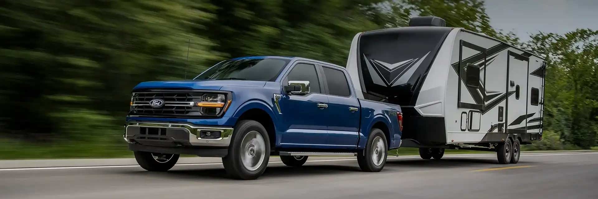 New 2025 Ford F-150 towing a camper
