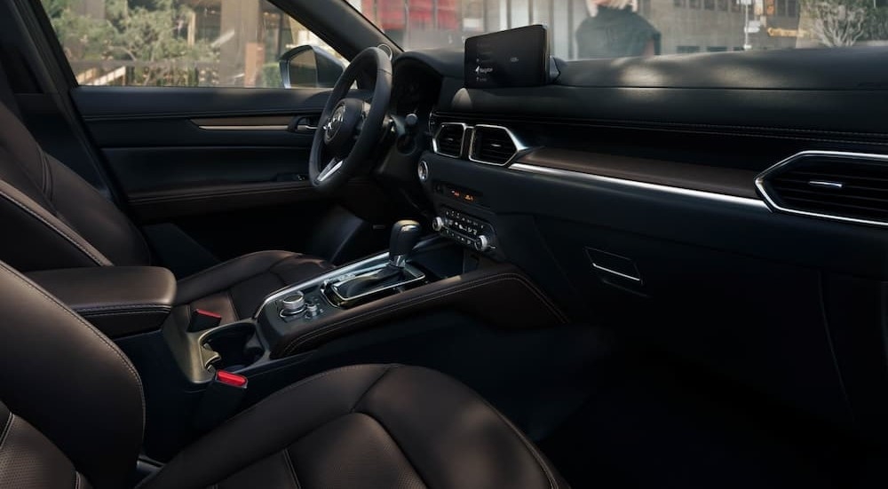 The black interior in a 2025 Mazda CX-5 for sale near Houston.