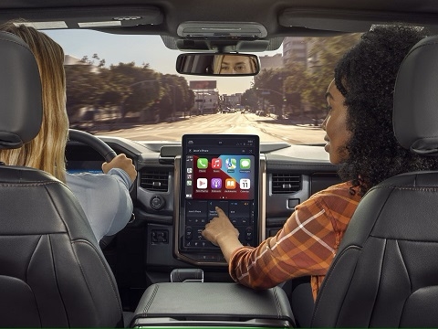 iOS CarPlay on the infotainment screen of a Ford vehicle