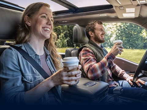 people riding in a Ford with Ford BlueCruise hands-free driving tech