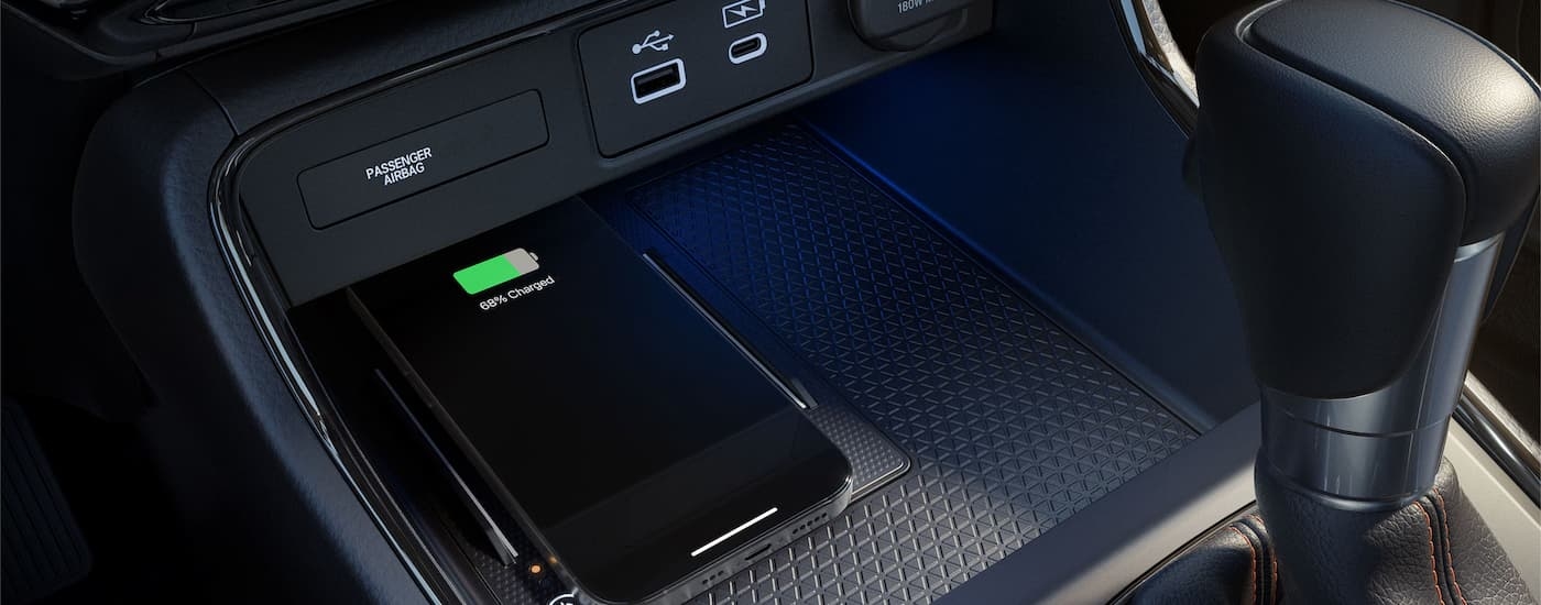 Phone in the center console of a 2026 Honda CR-V.