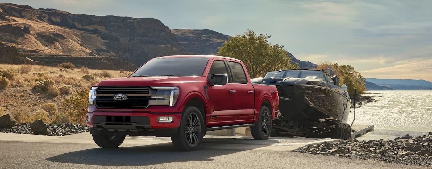 A red 2025 Ford F-150 for sale near Claremont from the front.