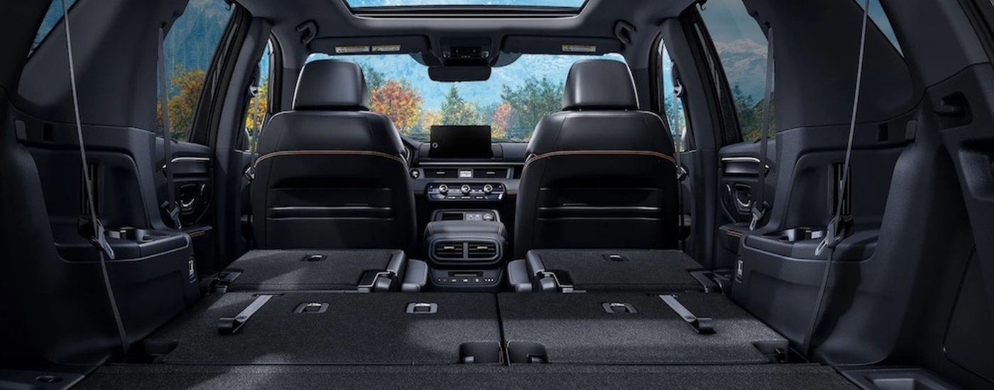 The black interior of a 2025 Honda Pilot.