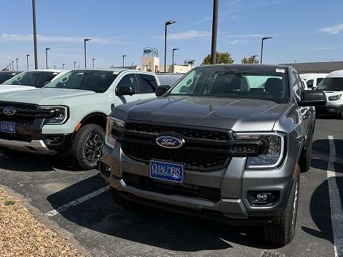 a row of 2025 Ford Ranger trucks parked at the Chalmers Ford dealership in Albuquerque, NM