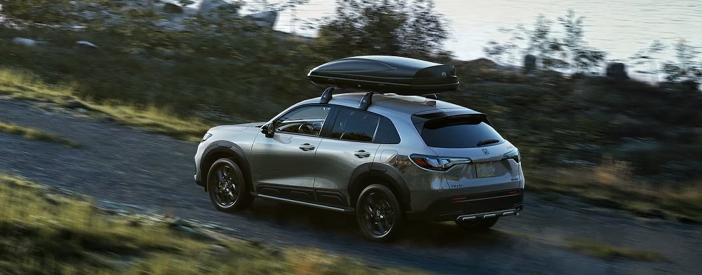 A silver 2023 Honda HR-V from the rear at an angle.