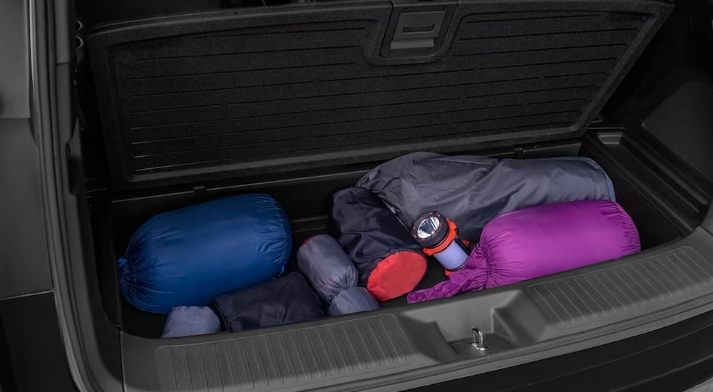 Camping gear in rear storage space in a 2025 Honda Pilot