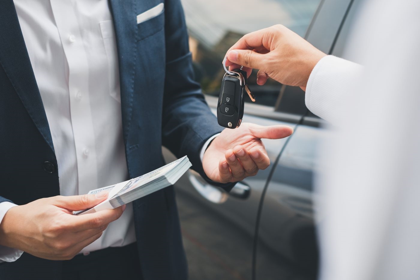 Finance expert assisting with a trade-in value estimate