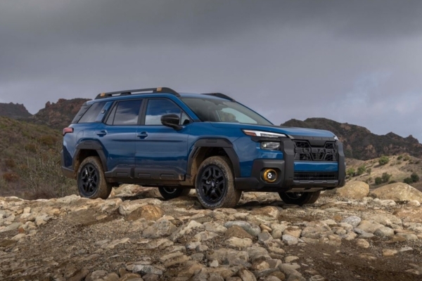 2026 Subaru Outback Wilderness coming soon to Castle Subaru McHenry parked at a trailhead