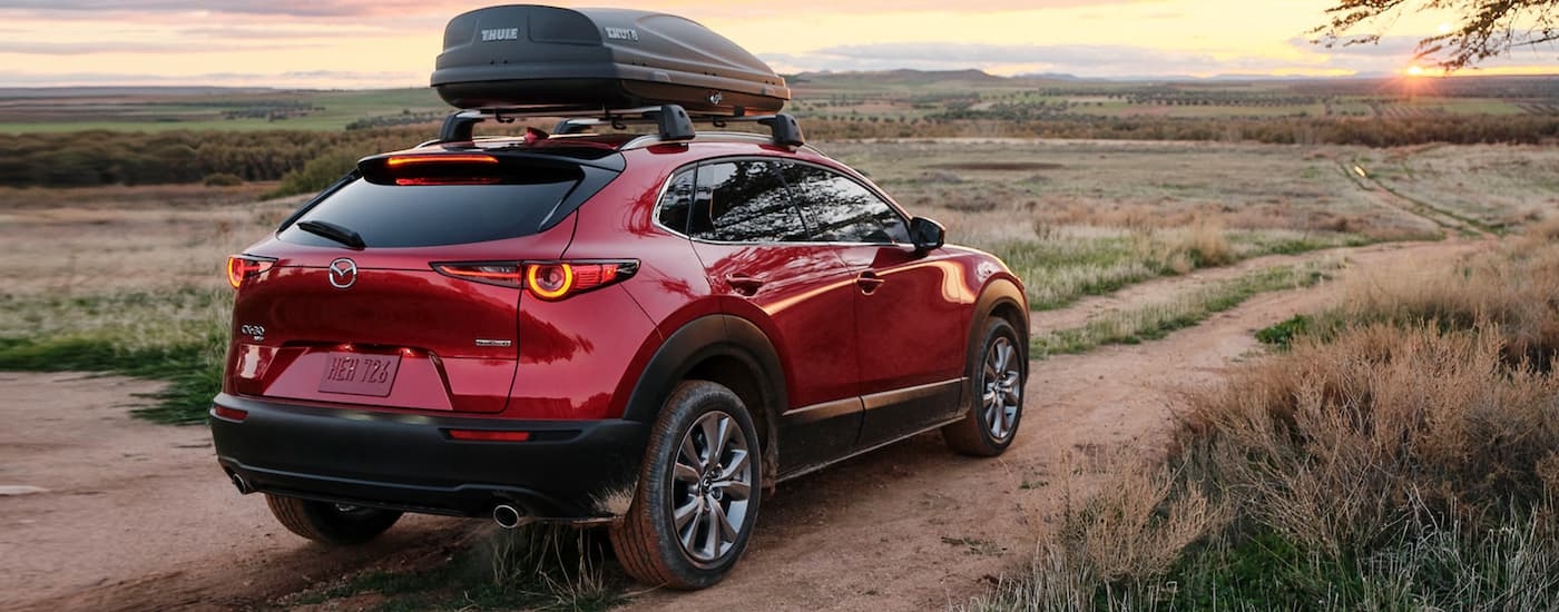A red 2021 Mazda CX-30 from the rear at an angle.