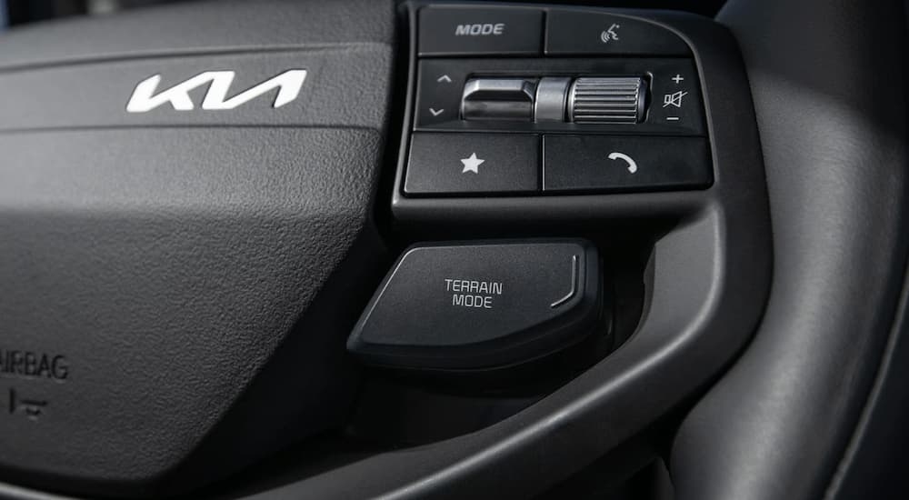Close up of the steering wheel on a 2026 Kia Sportage for sale near Humble
