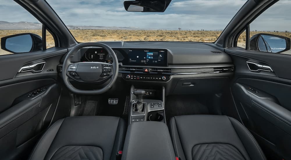 Dashboard and front black seating in a 2026 Kia Sportage