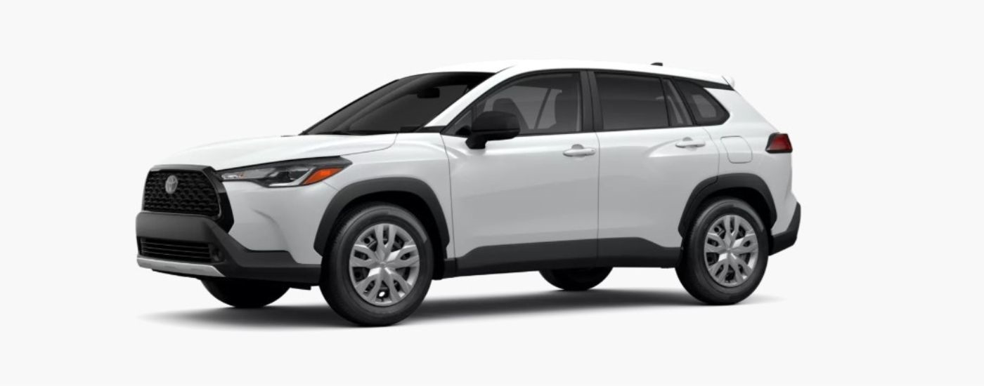 A white 2025 Toyota Corolla Cross angled left.