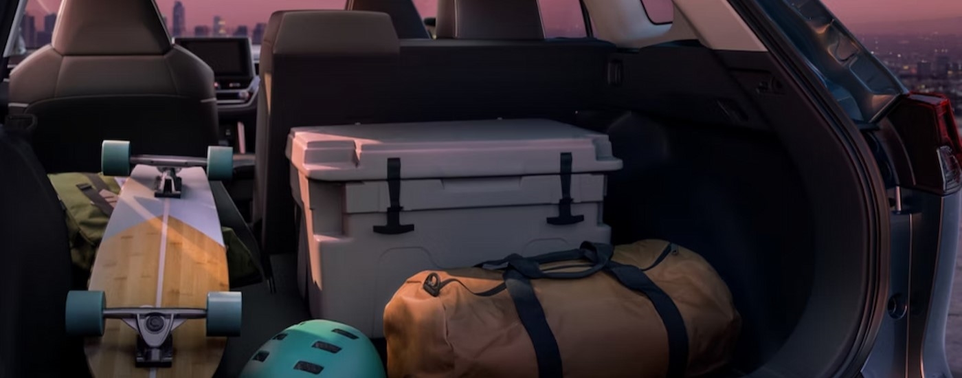 Close-up of the rear cargo area in a blue 2025 Toyota Corolla Cross.