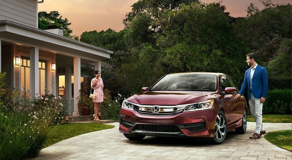 A red 2017 Honda Accord parked on a driveway.