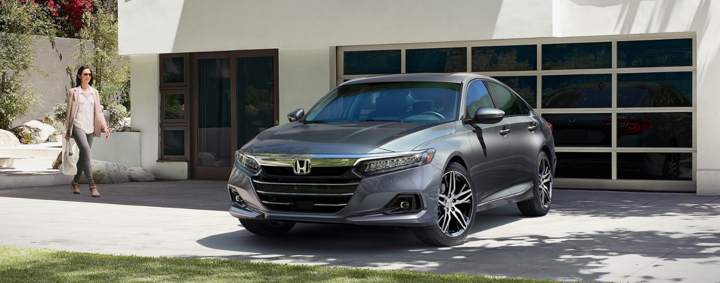 A gray 2021 Honda Accord parked on a driveway.