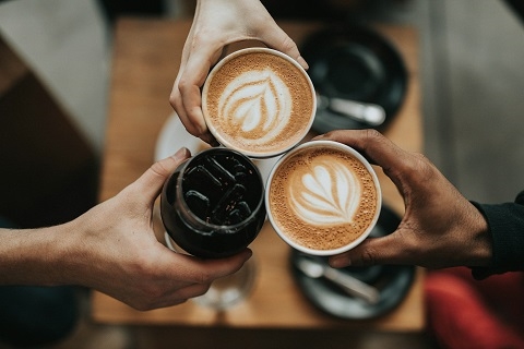 people drinking coffee at a coffee shop in mission viejo, CA