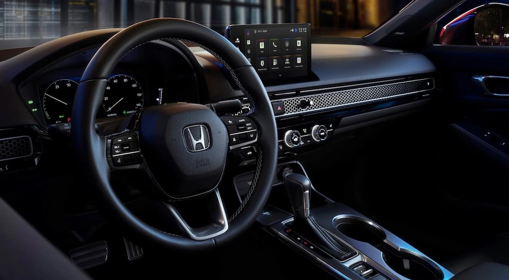 The black dash in a 2026 Honda Civic for sale near Bellevue.