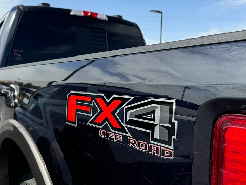 Ford FX4 offroad badge on a Ford F-150 truck parked at the Chalmers Ford dealership in Albuquerque, NM