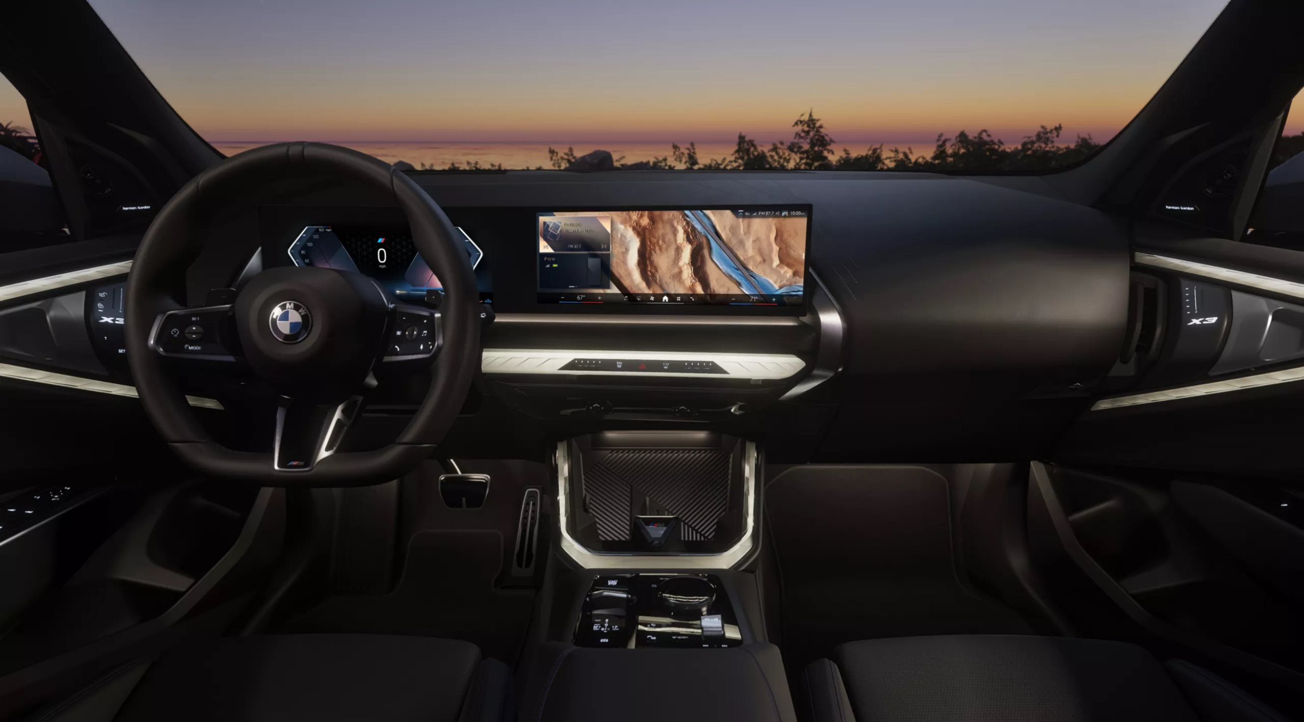 BMW cabin overlooking a Southern California sunset with navigation displayed