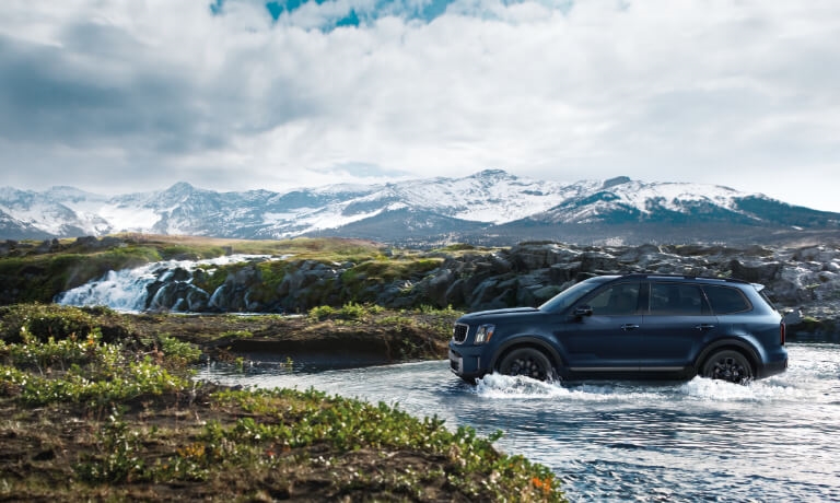2025 Kia Telluride Exterior Driving Through Water Side View