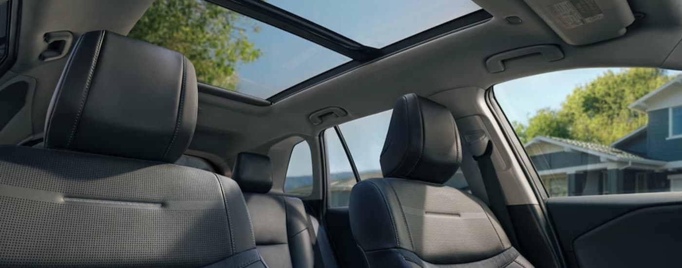 Gray interior and sunroof in a 2025 Toyota RAV4 Hybrid.