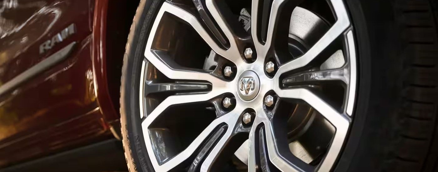 Close up of the rim on a red 2025 Ram 1500 for sale near Hyde Park