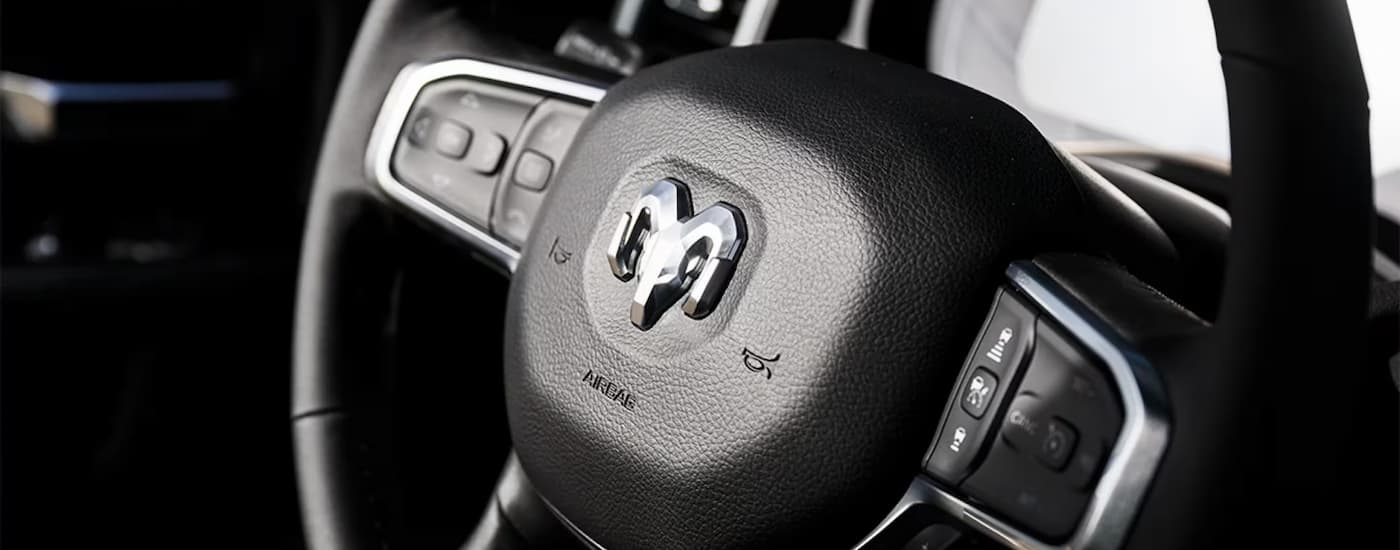 Close up of the steering wheel on a 2025 Ram 2500 for sale near Hyde Park