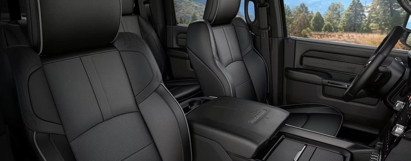 The front seats in a 2025 Ram 3500 for sale near Hyde Park