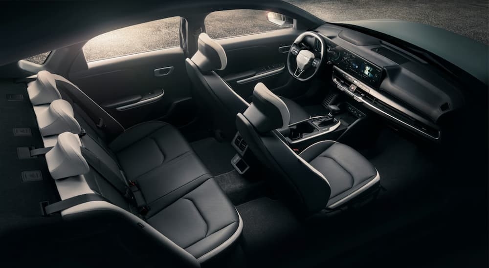 The black interior of a 2025 Kia K4 for sale near Tomball