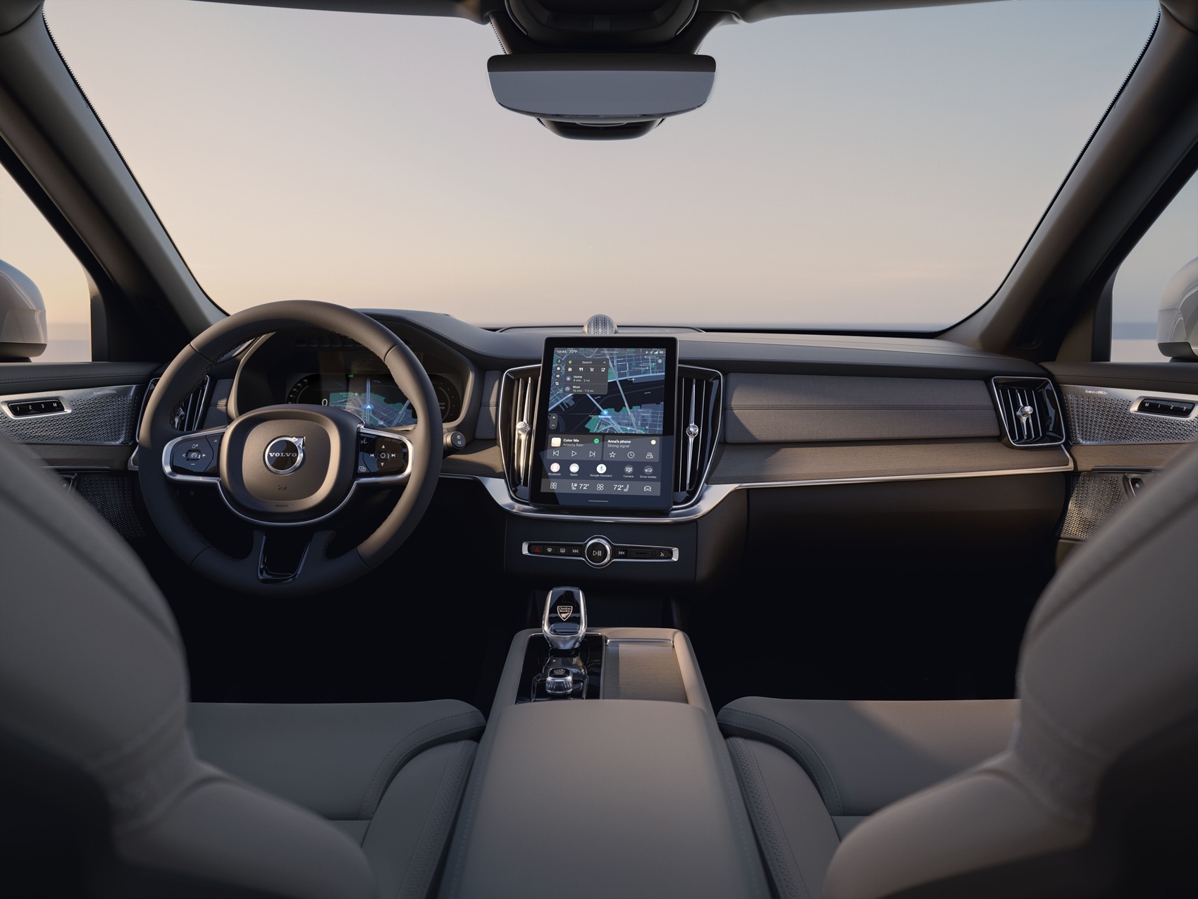 Interior view of Volvo XC90 dashboard and front row seats