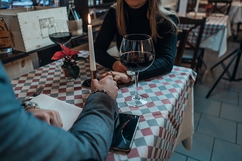 people on a date sitting at a table in Albuquerque, NM