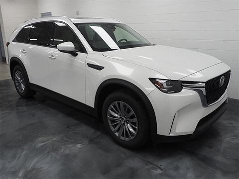 white 2025 Mazda CX90 SUV parked at the Bountiful Mazda showroom in Bountiful, UT