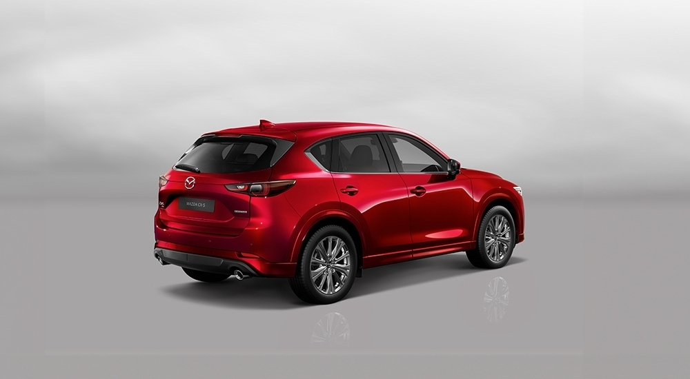 Red 2025 Mazda CX-5 against a grey backdrop