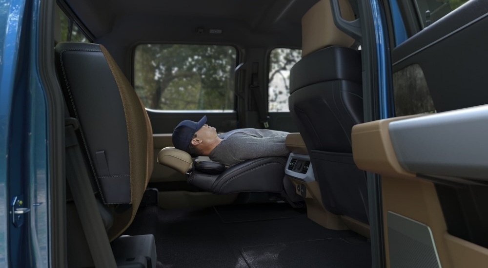 Person resting in a 2025 Ford F-350 Super Duty for sale