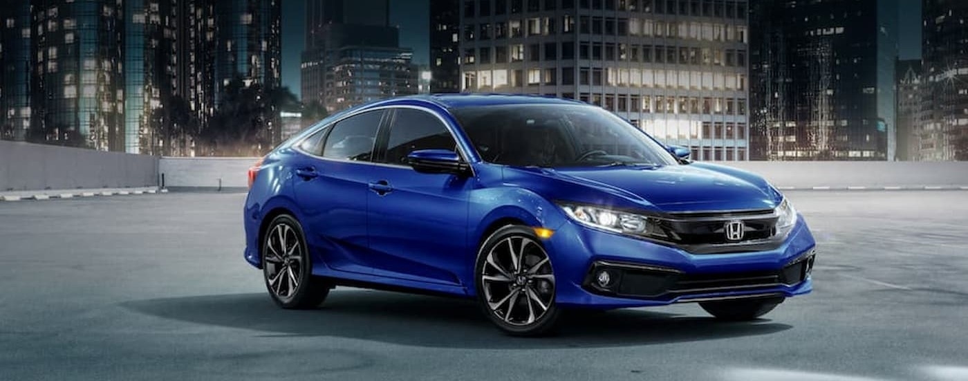 A blue 2021 Honda Civic parked after viewing a used Honda Civic for sale near Paramus.