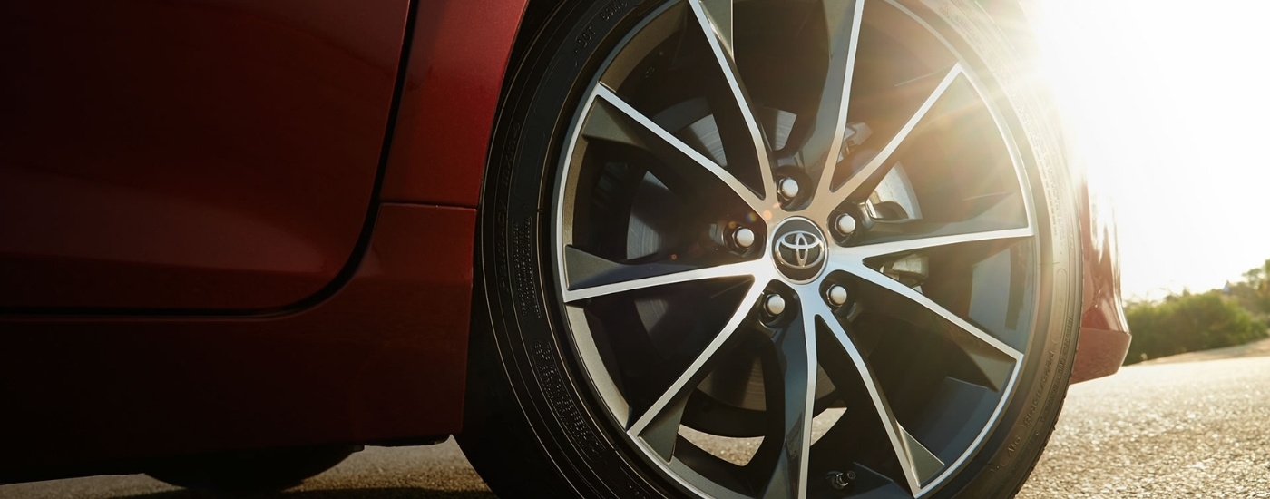 Wheel on a red 2015 Toyota Camry for sale near The Bronx