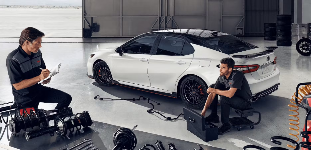Toyota service technician performing maintenance