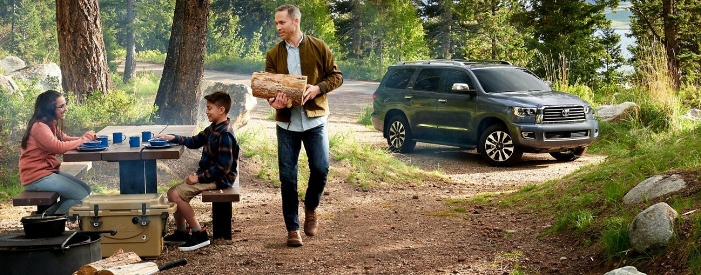 Grey 2022 Toyota Sequoia at a campsite