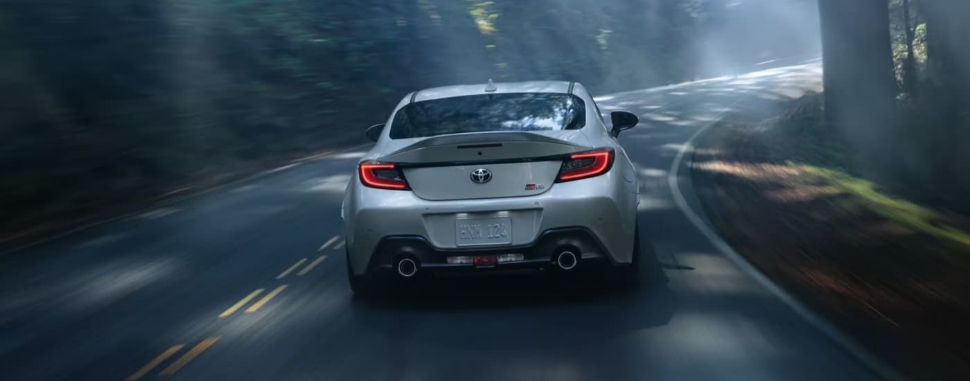 White 2022 used Toyota GR86 for sale near Keene rounding a corner