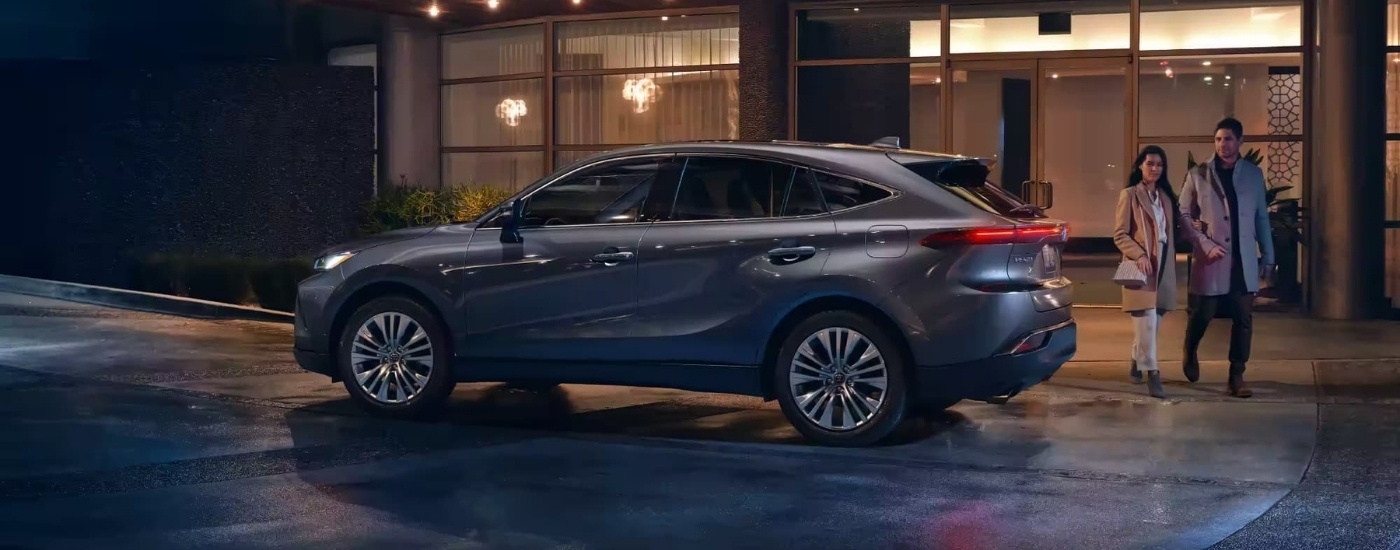 Grey 2023 used Toyota Venza for sale near Brattleboro parked in front of a building