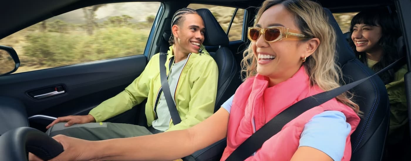 Group of friends driving in a 2025 Toyota Corolla Cross