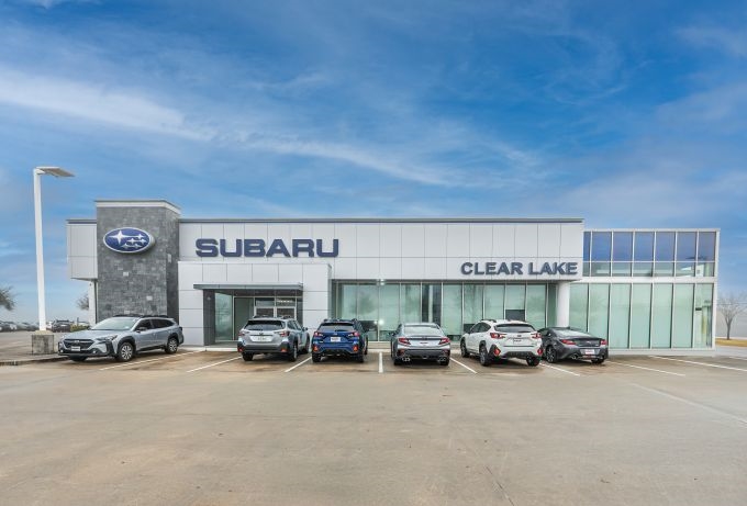 Happy Team Gillman Subaru North Happy female customer after buying new Subaru SUV 