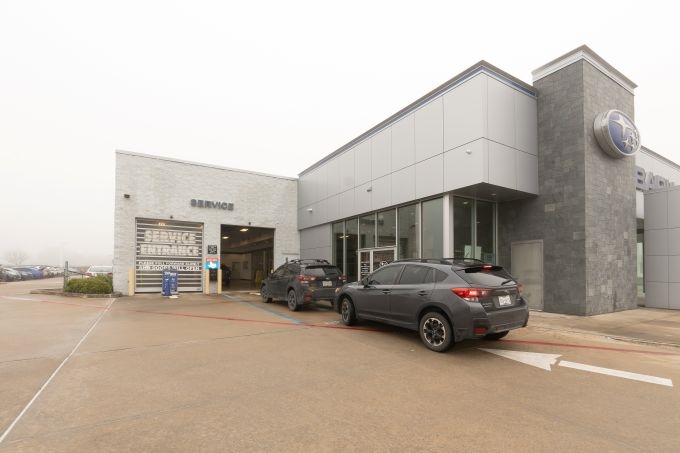 Happy Team Gillman Subaru North Happy female customer after buying new Subaru SUV 