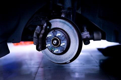 brake pad on a car getting brake service at the Volvo Cars Mission Viejo service center in Mission Viejo, CA