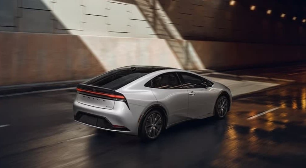 A white 2026 Toyota Prius entering a tunnel.